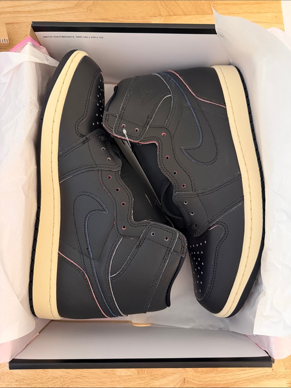 Nike Black High-Top Sneakers with Cream Soles and Pink & Blue Accents